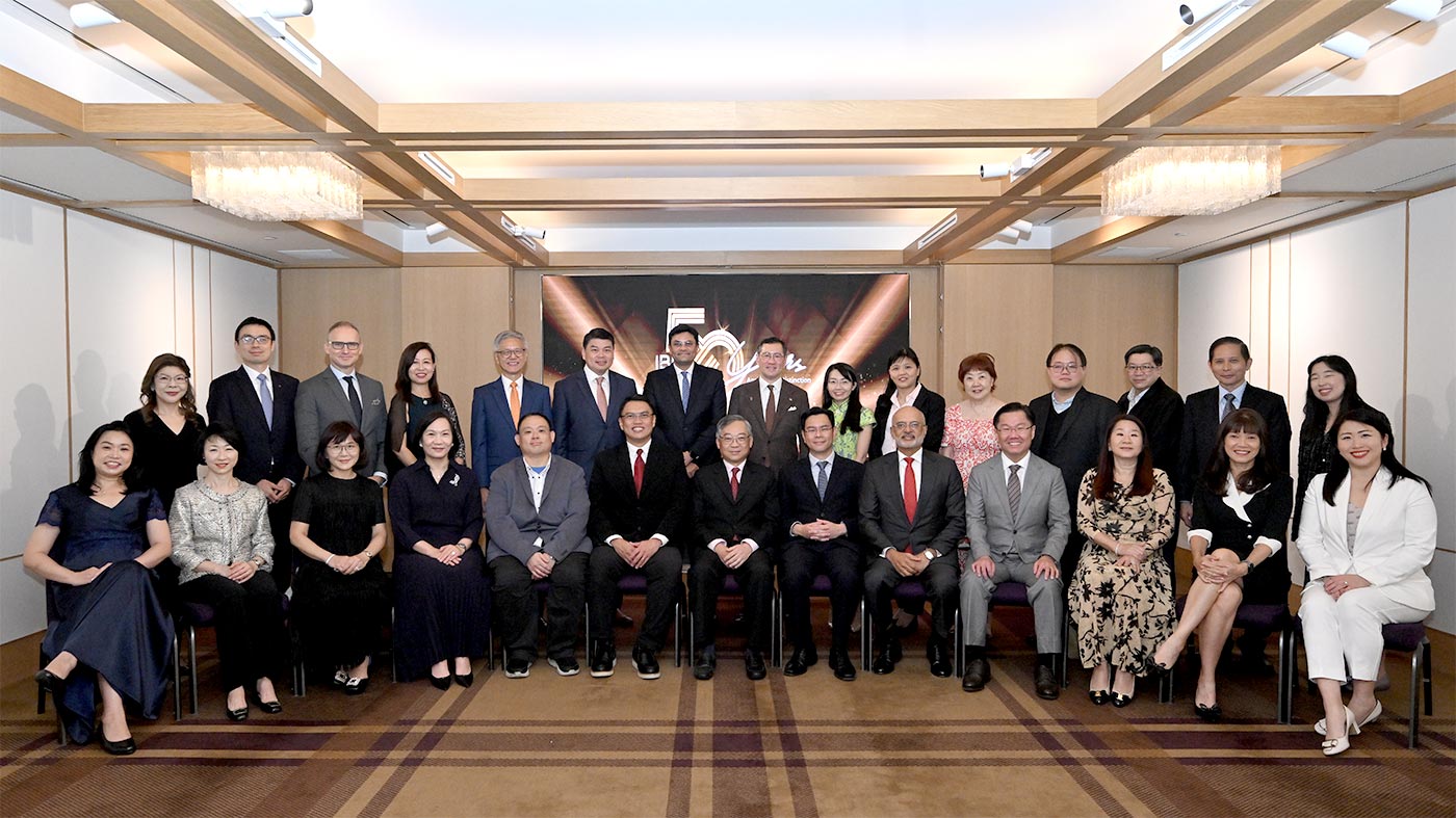 DPM Gan and IBF Chairman Der Jiun with NTUC Assistant Secretary-General, Patrick Tay, IBF Council members and representatives of financial industry unions at our IBF 50th anniversary celebration.