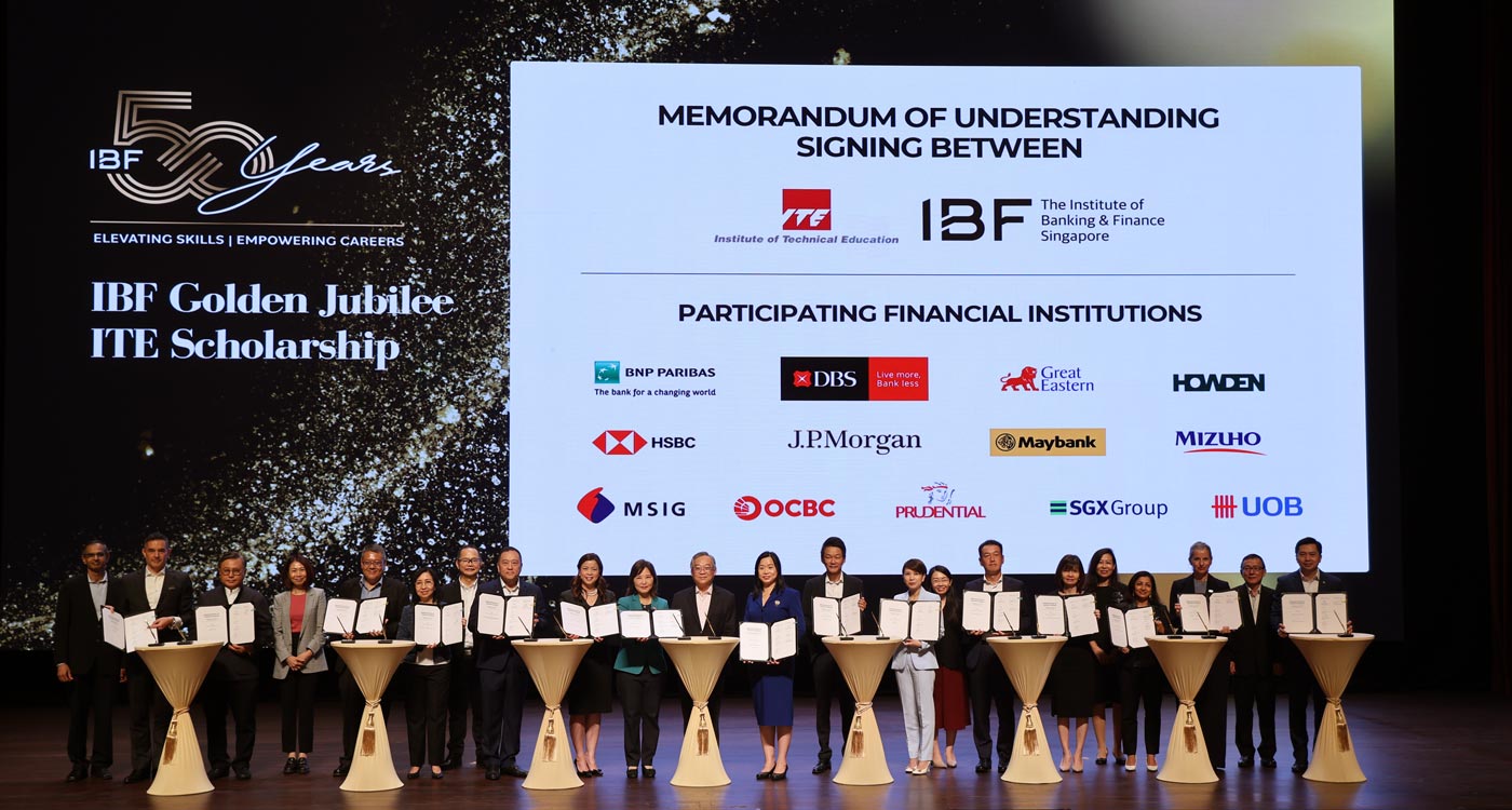 Memorandum of Understanding signing ceremony between ITE and 13 participating financial institutions at the launch of IBF Golden Jubilee ITE Scholarship.